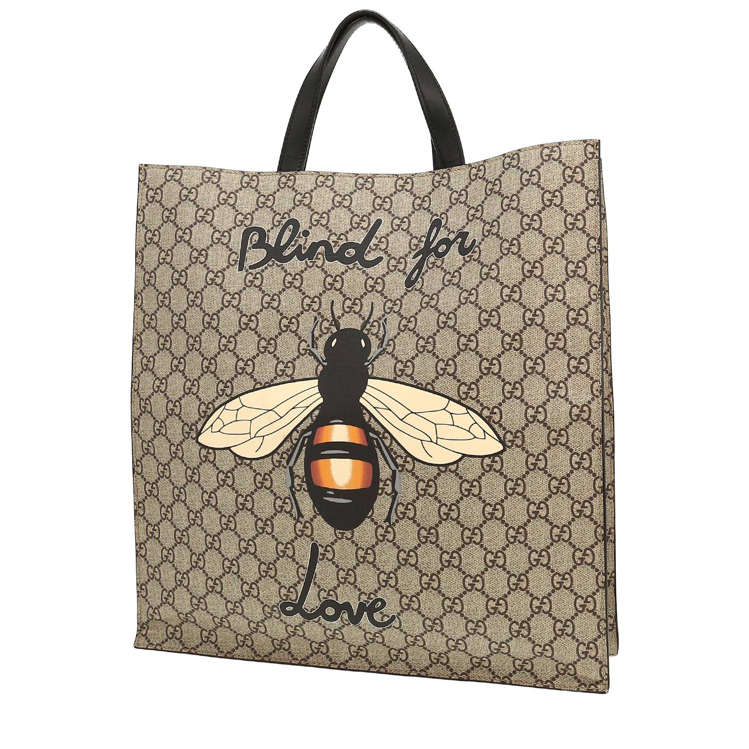 Gucci handbag in beige logo canvas and black leather