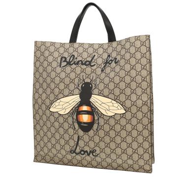 Borsa Gucci   in tela siglata beige e pelle nera