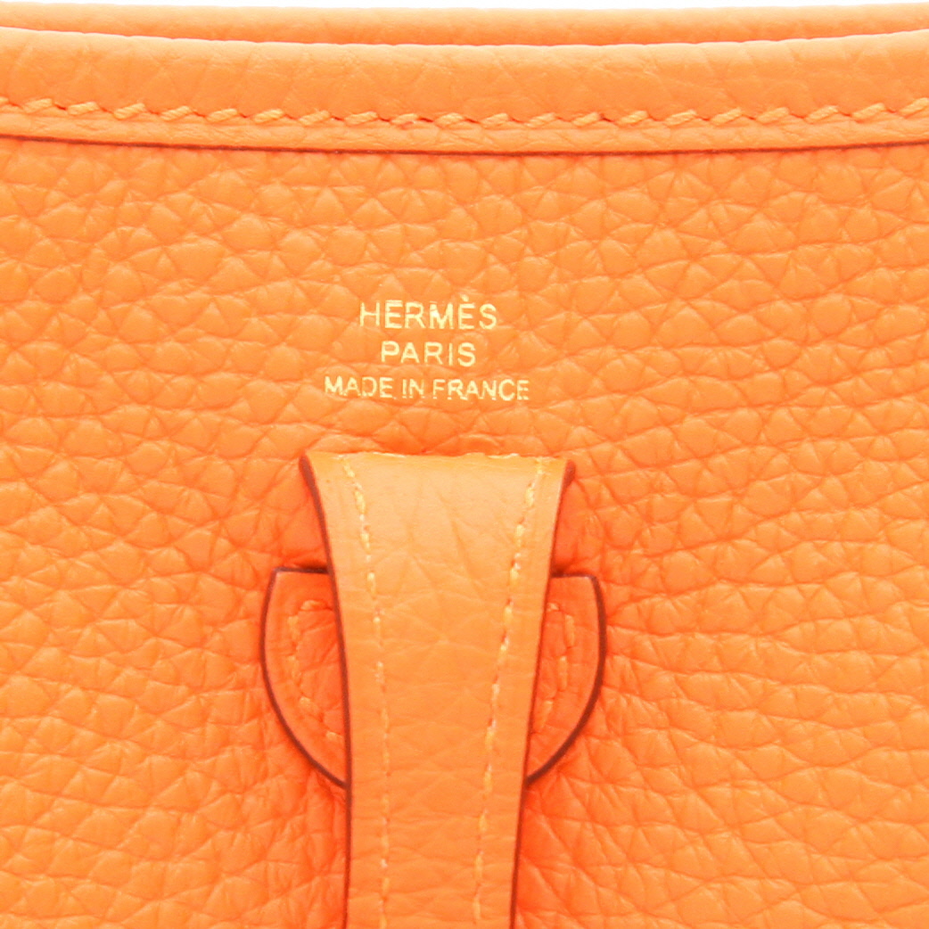 Hermès  Evelyne 16 cm shoulder bag  in orange leather taurillon clémence - Detail D2