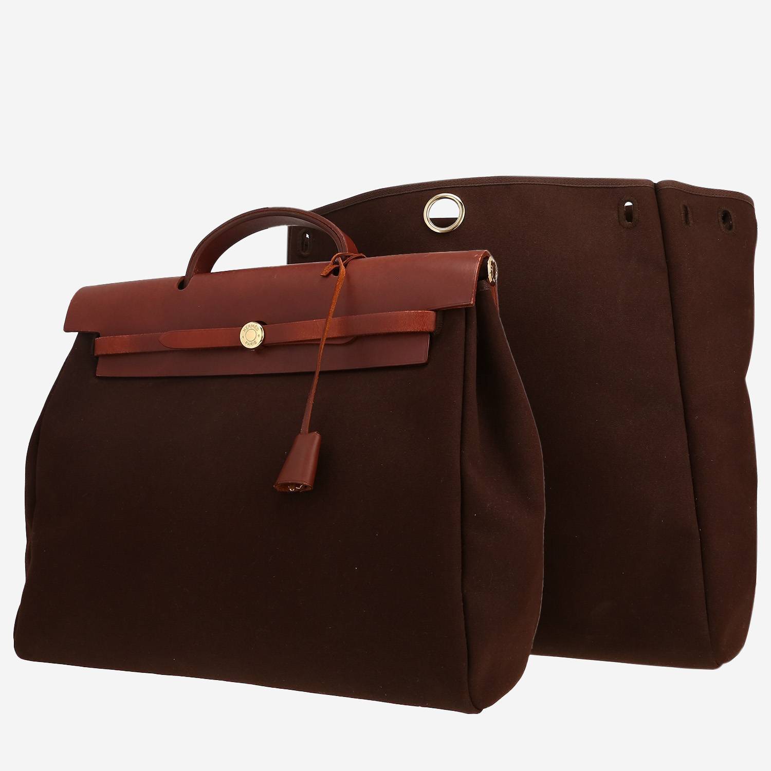 Hermès  Herbag bag worn on the shoulder or carried in the hand  in brown canvas  and brown leather