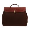 Hermès  Herbag bag worn on the shoulder or carried in the hand  in brown canvas  and black leather - Detail D4 thumbnail