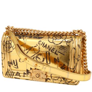 Sac bandoulière Chanel  Boy moyen modèle  en cuir doré