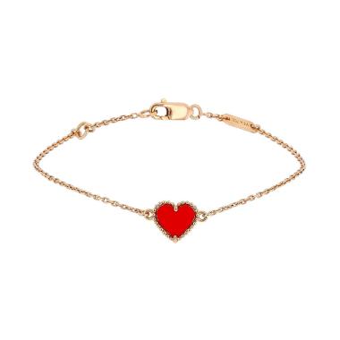 Van Cleef 
Arpels Sweet Hearts bracelet in pink gold and cornelian