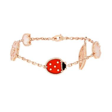 Van Cleef 
Arpels Lucky Spring bracelet in pink gold, mother of pearl and cornelian