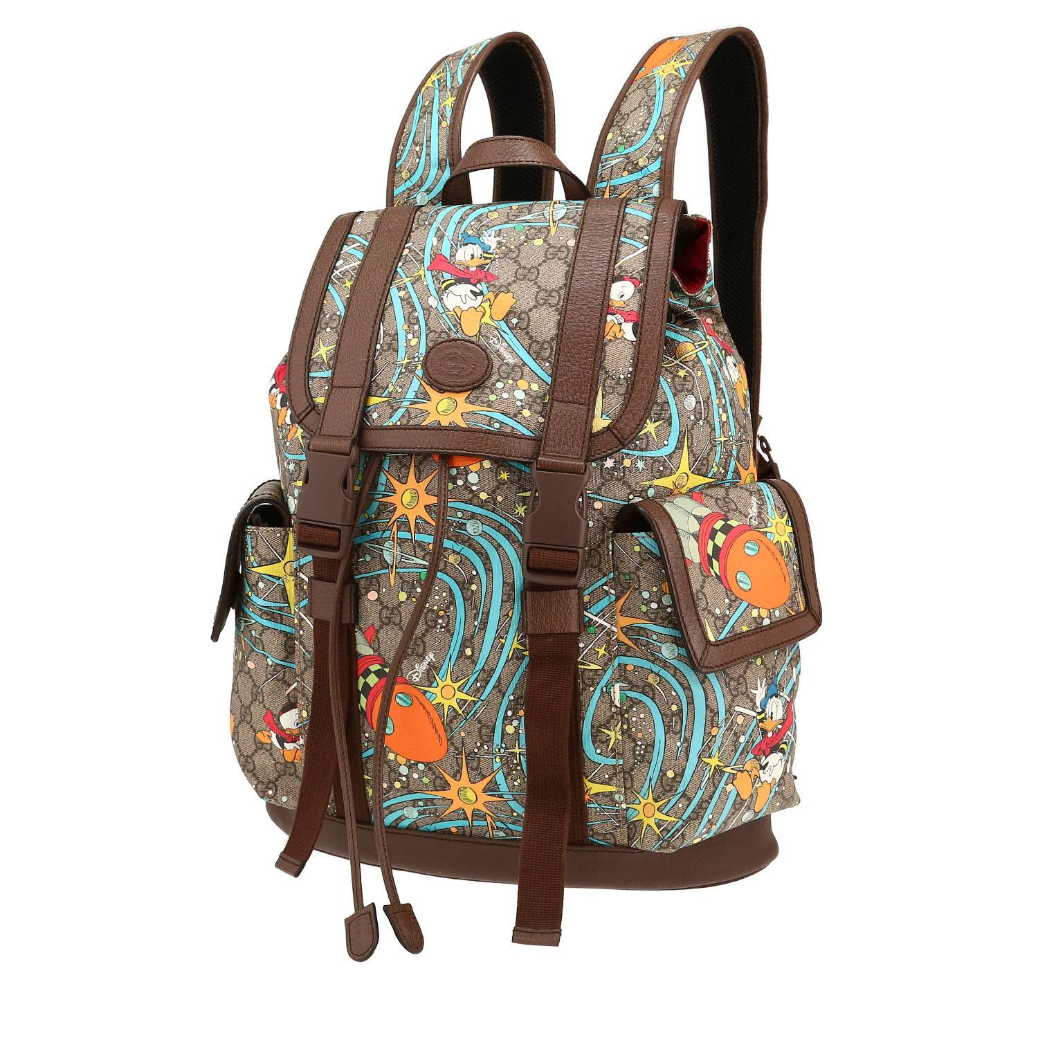 Mochila Gucci   en tejido "sûpreme GG" y cuero marrón