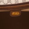 Borsa da viaggio Gucci   in tela monogram beige e pelle marrone - Detail D2 thumbnail