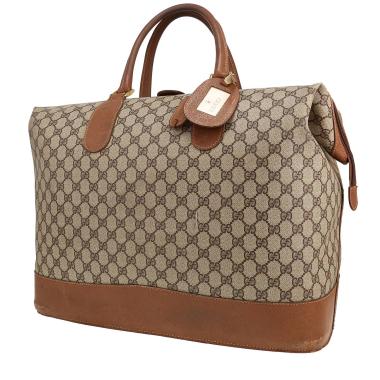 Bolsa de viaje Gucci   en lona Monogram beige y cuero marrón