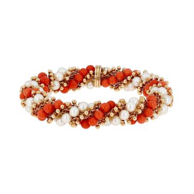 Van Cleef & Arpels Twist bracelet in yellow gold, South sea cultured pearls and coral