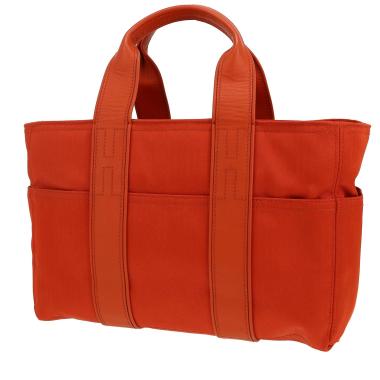 Bolso de mano Hermès  Acapulco en lona y cuero naranja