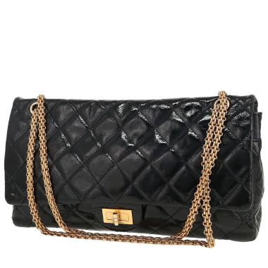Bolso de mano Chanel 2.55 en charol acolchado azul