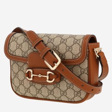 Gucci  1955 Horsebit small model  shoulder bag  in beige monogram canvas  and brown leather
