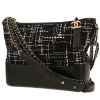 Borsa a tracolla Chanel  Gabrielle  in tweed nero e bianco e pelle nera - 00pp thumbnail