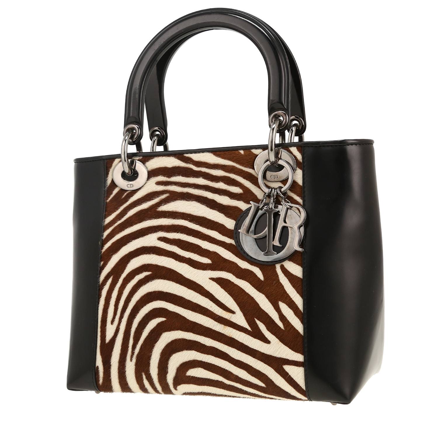 Bolso de mano Dior  Lady Dior en piel de potro marrón y blanca y cuero negro