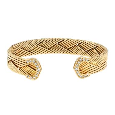 Bracciale aperto Cartier C de Cartier in oro giallo e diamanti