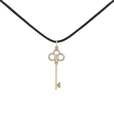 Pendentif Tiffany 
Co Clé Couronne en or jaune et diamants Pendentif Tiffany 
Co Clé Couronne en or jaune et diamants