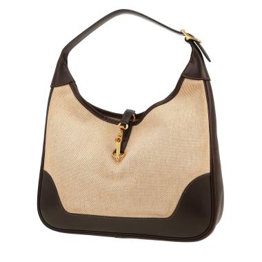 Hermès  Trim bag worn on the shoulder or carried in the hand  in beige canvas  and brown box leather