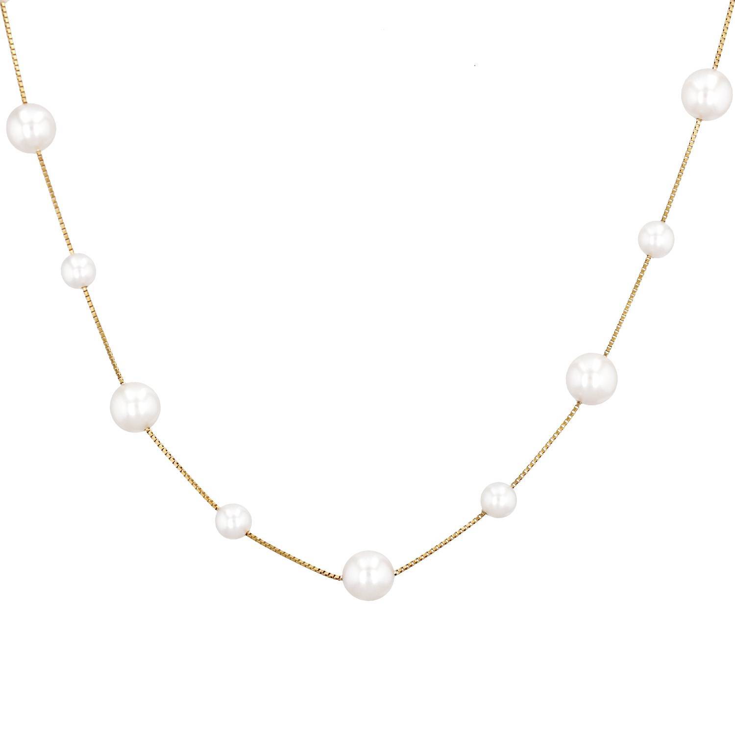 Sautoir Tasaki  en or jaune et perles de culture