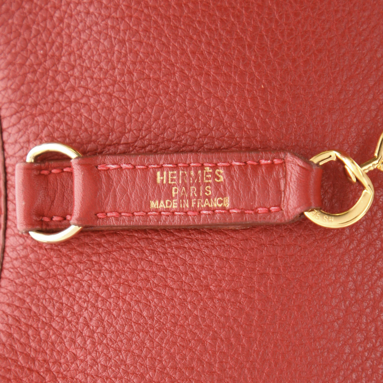 Hermès  Trim bag worn on the shoulder or carried in the hand  in red Vif leather taurillon clémence - Detail D2