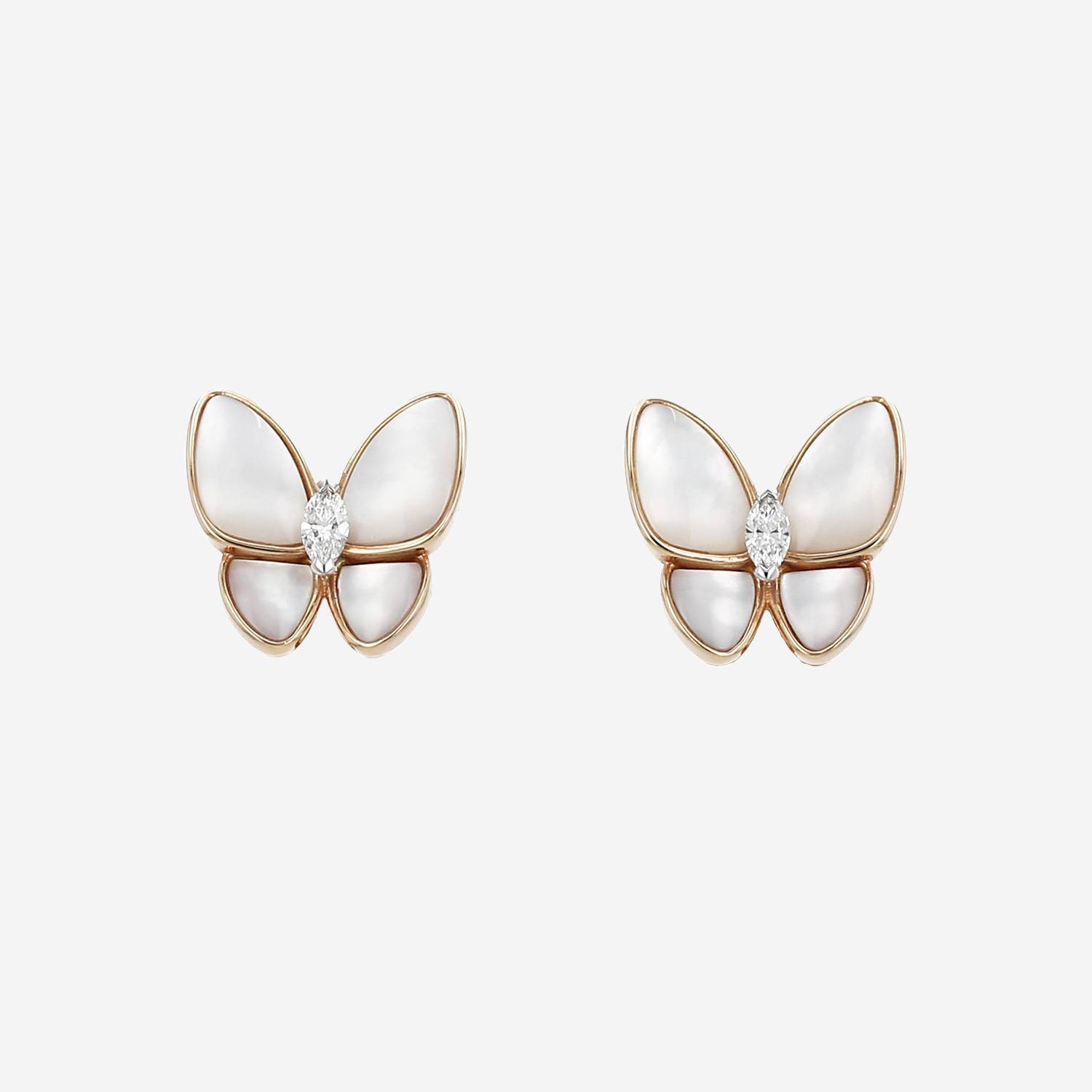 Van Cleef 
Arpels Deux Papillons earrings in yellow gold, mother of pearl and diamonds