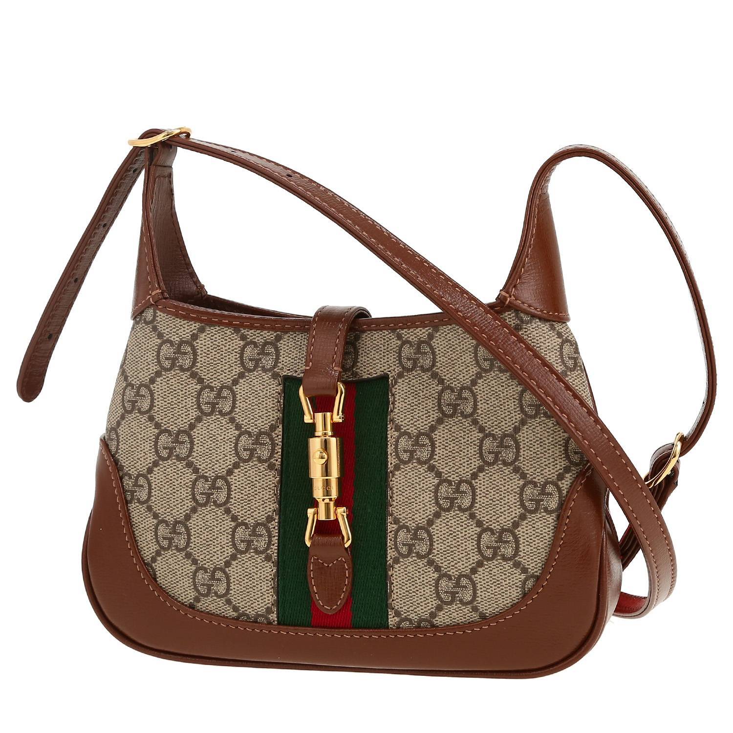 Gucci  Jackie small model  shoulder bag  in brown leather  and beige "sûpreme GG" canvas