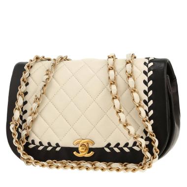 Sac bandoulière Chanel   en cuir matelassé noir et blanc