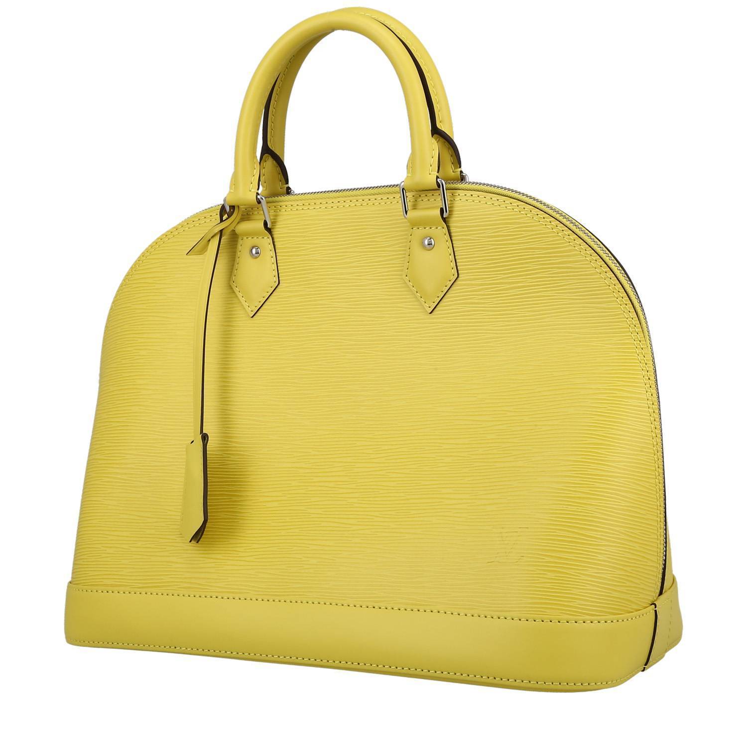 Sac à main Louis Vuitton  Alma grand modèle  en cuir épi jaune