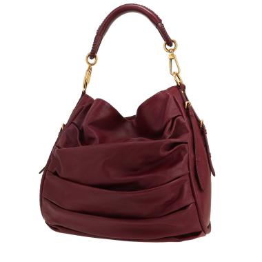Bolso Cabás Dior  Libertine en cuero color burdeos