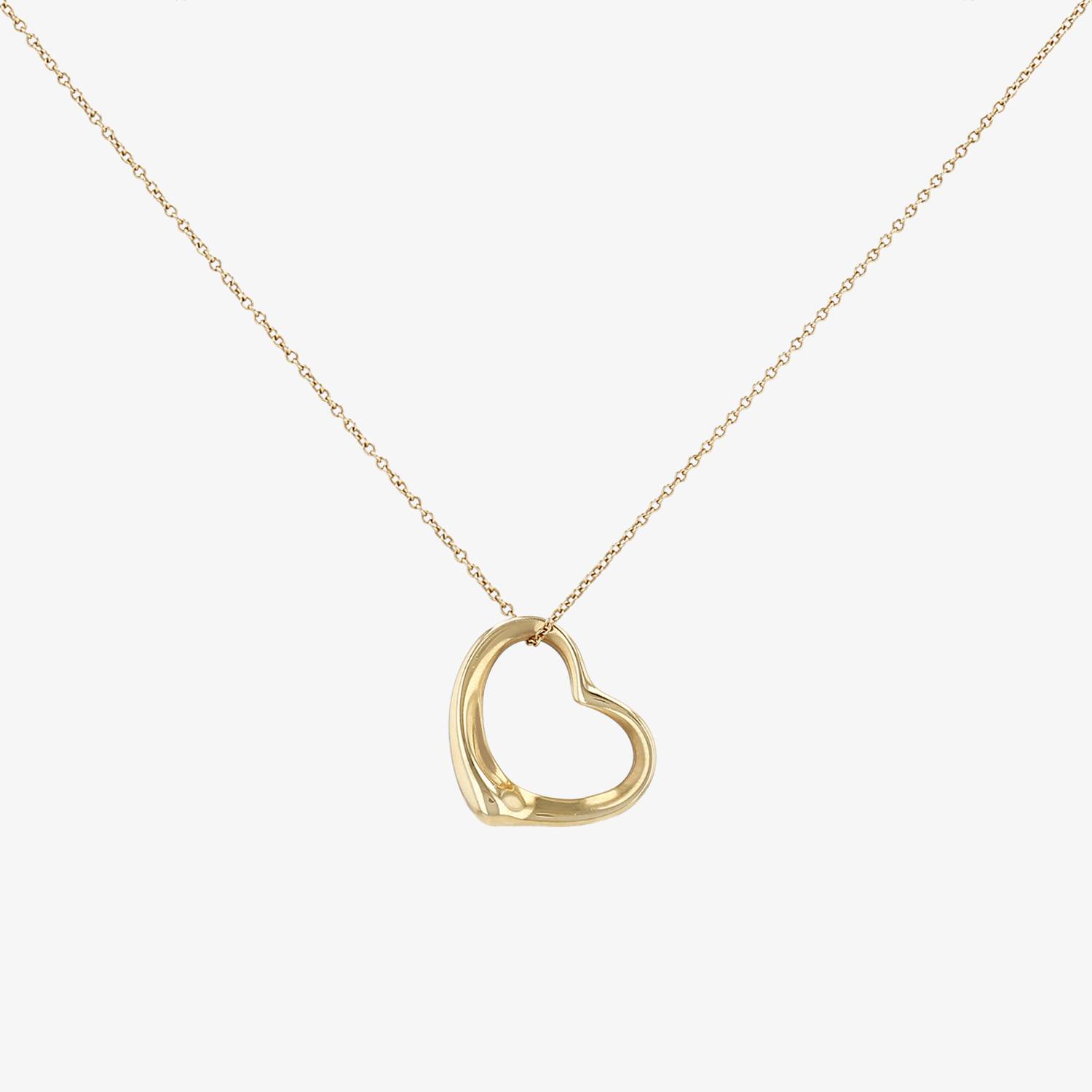 Tiffany 
Co Open Heart medium model necklace in yellow gold