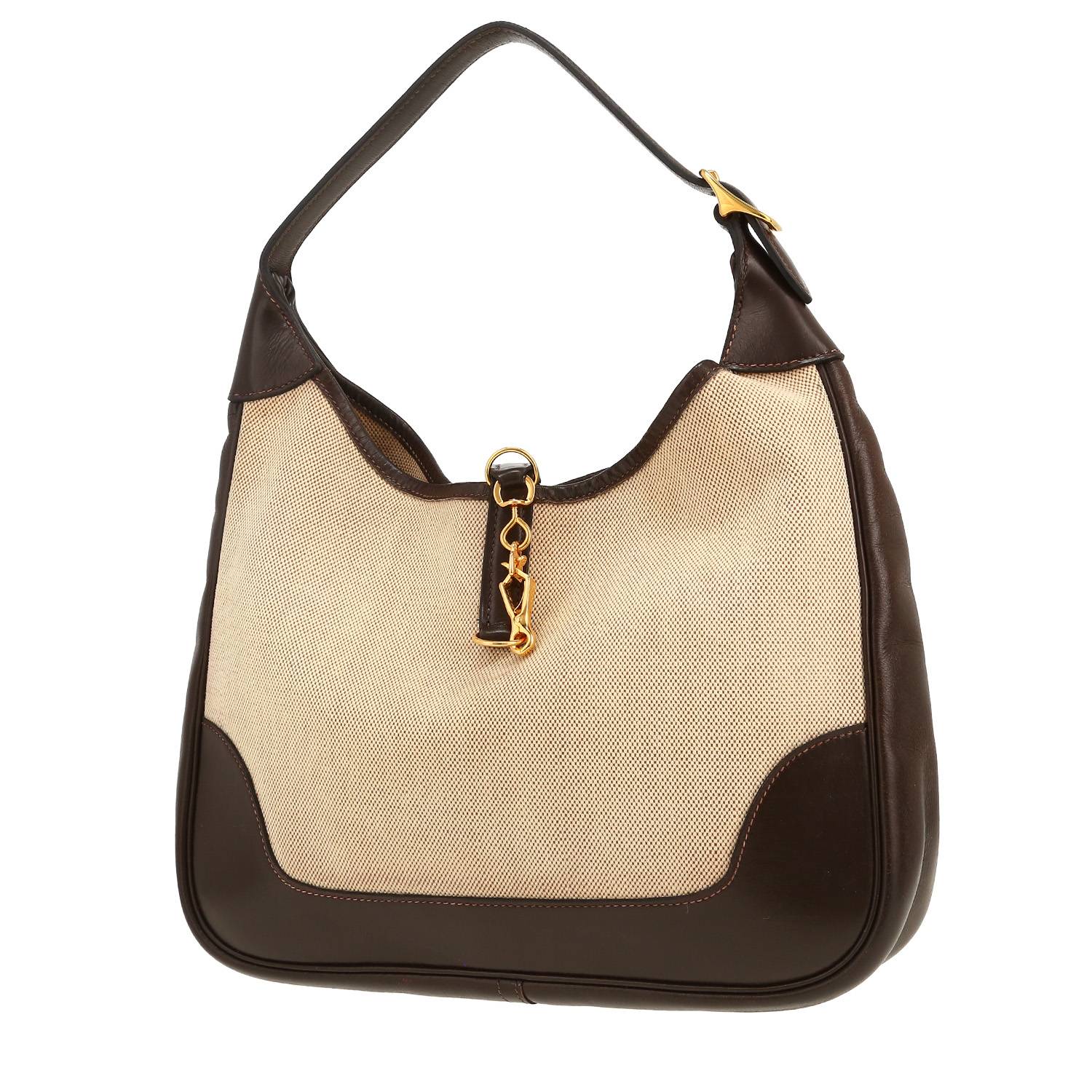 Hermès Trim bag worn on the shoulder or carried in the hand in beige canvas and brown box leather
