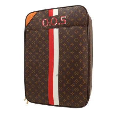 Louis Vuitton  Pegase suitcase  in brown monogram canvas  and natural leather