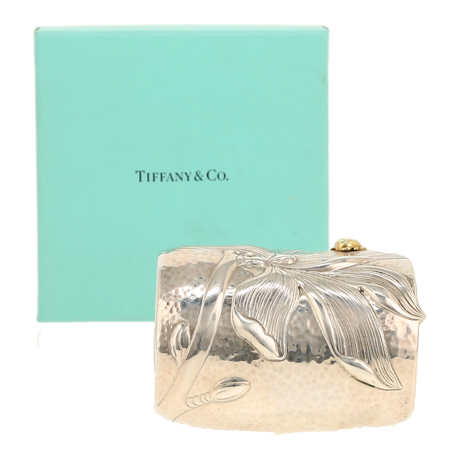Tiffany 
Co Magnolia cuff bracelet in silver and yellow gold