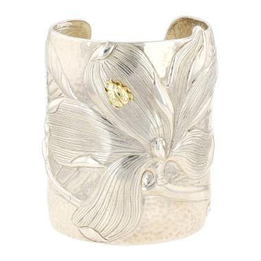 Tiffany 
Co Magnolia cuff bracelet in silver and yellow gold