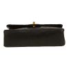 Chanel  Timeless Petit handbag  in black quilted leather - Detail D1 thumbnail