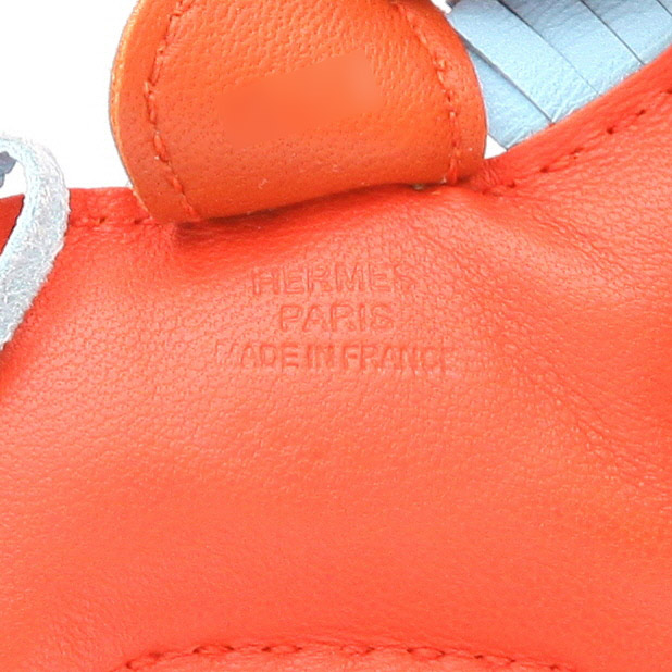 Hermès  Rodeo  bag accessory  in blue, red and Terre Battue Swift leather - Detail D2