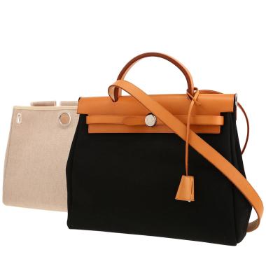 Bolso Hermès «Herbag» de lona negra y piel natural, para llevar al hombro o en la mano