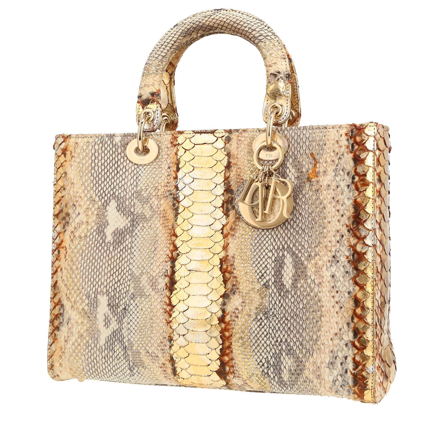 Sac à main Dior  Lady Dior grand modèle  en python beige et doré