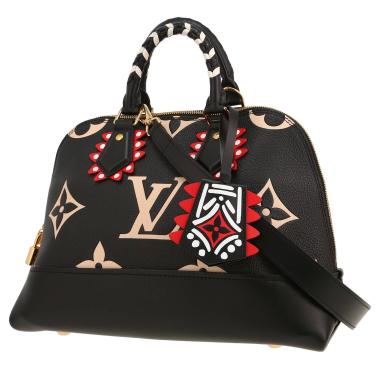 Louis Vuitton  Alma Editions Limitées handbag  in black and beige monogram leather