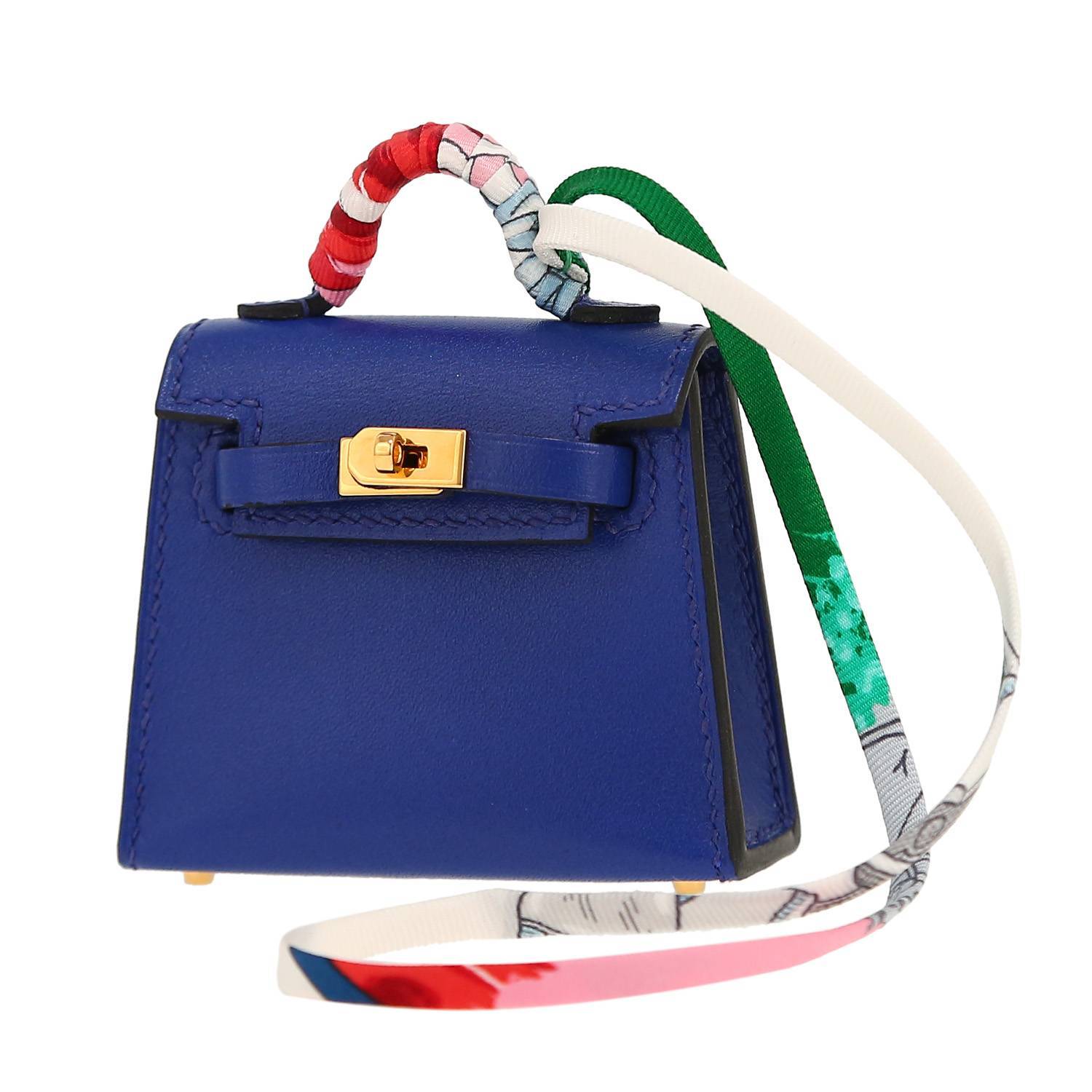 Accessorio per borsa Hermès  Kelly Twilly bag charm in pelle Tadelakt blu e seta multicolore - 00pp