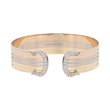 Bracciale Cartier C de Cartier in 3 ori e diamanti