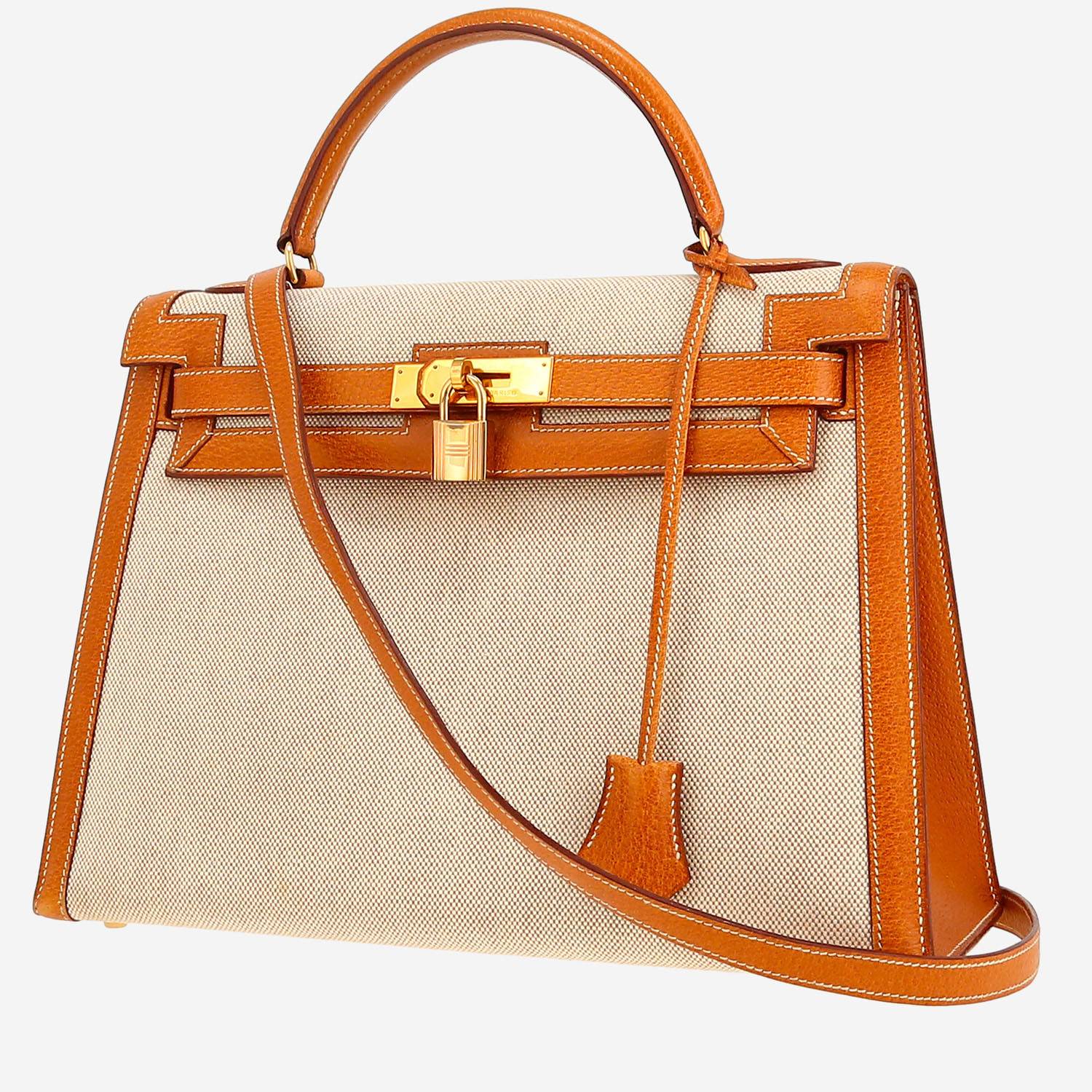 Sac à main Hermès  Kelly 32 cm en toile beige et cuir de Pecari gold
