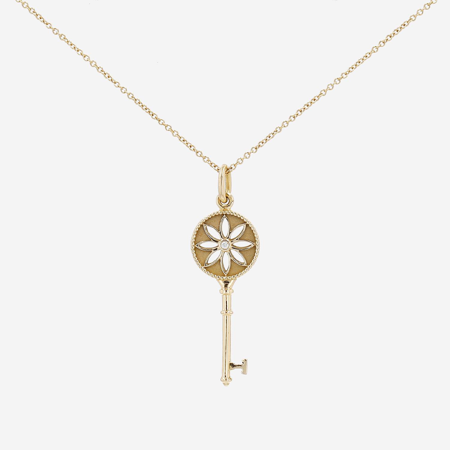 Tiffany 
Co Clé Marguerite pendant in yellow gold and diamond