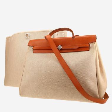 Hermès  Herbag bag worn on the shoulder or carried in the hand  in beige canvas  and Hunter cowhide