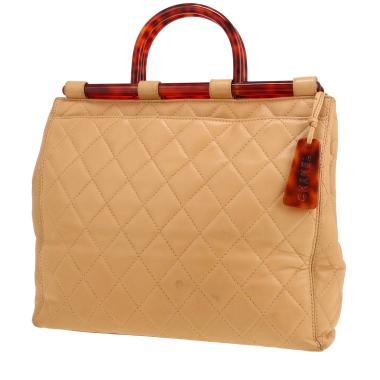 Chanel  Vintage shopping bag  in beige quilted leather