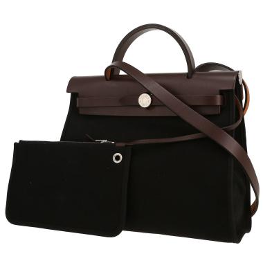 Hermès  Herbag bag worn on the shoulder or carried in the hand  in black canvas  and brown leather