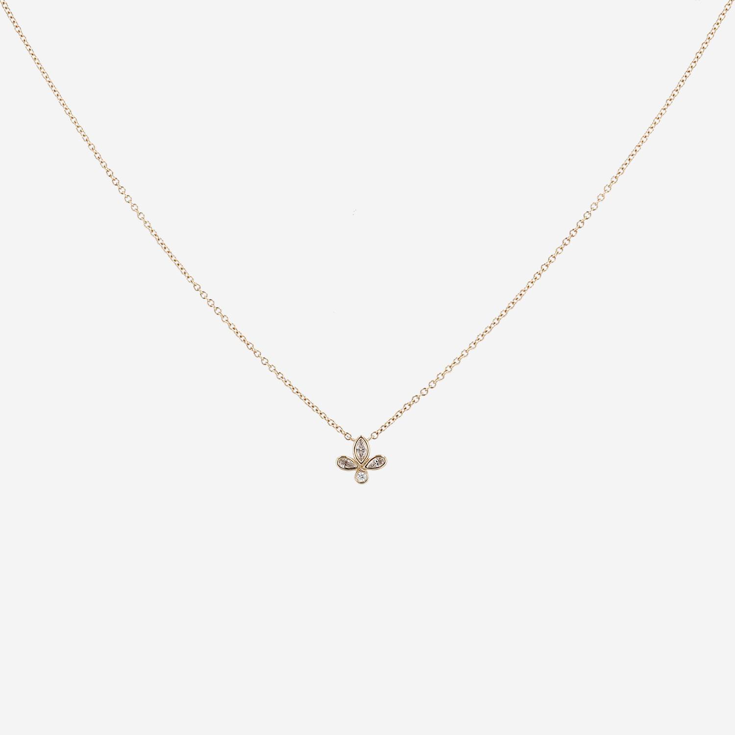 Tiffany 
Co Fleur de Lis necklace in yellow gold and diamondsand in diamonds