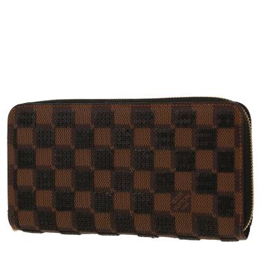Billetera Louis Vuitton  Zippy en lona Monogram revestida marrón y lentejuelas negras