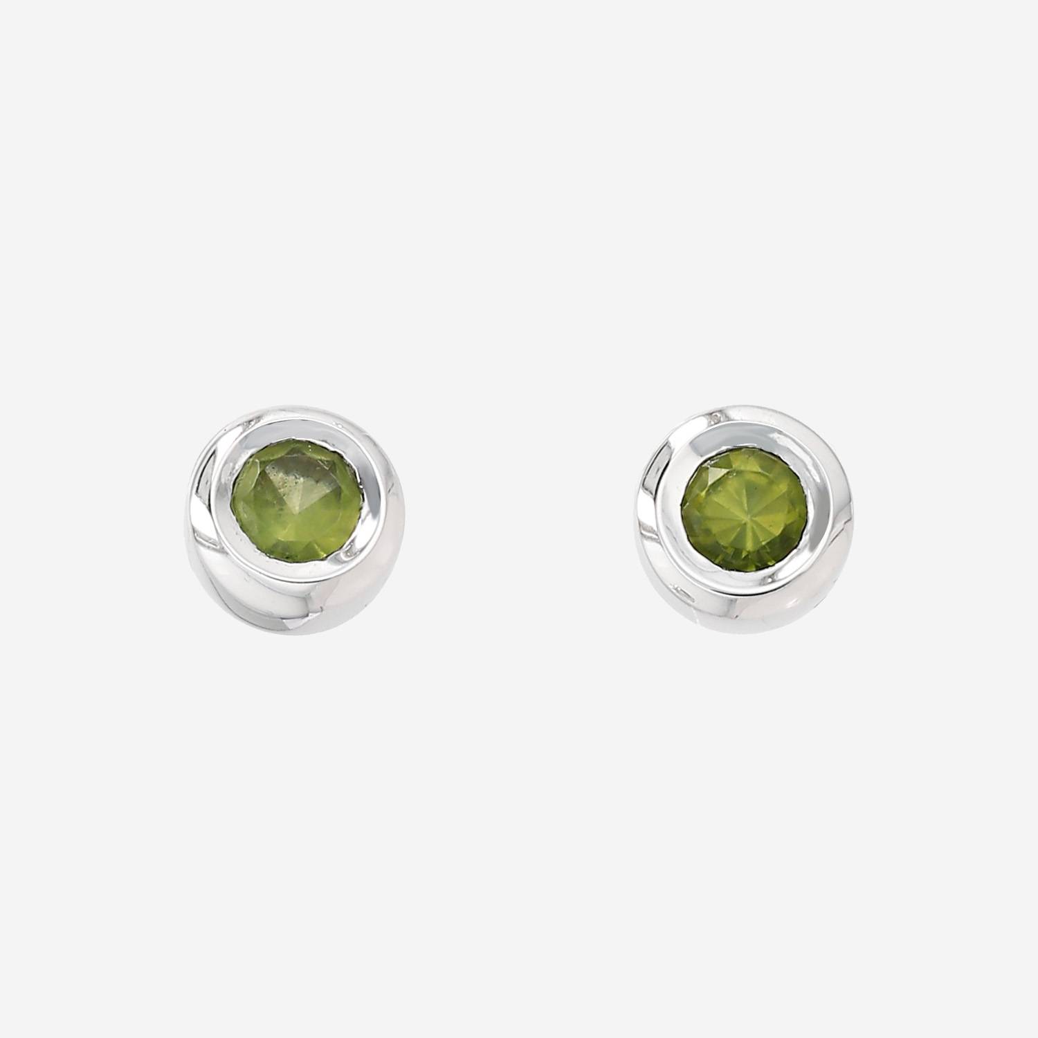 Dinh Van  earrings in white gold and peridot