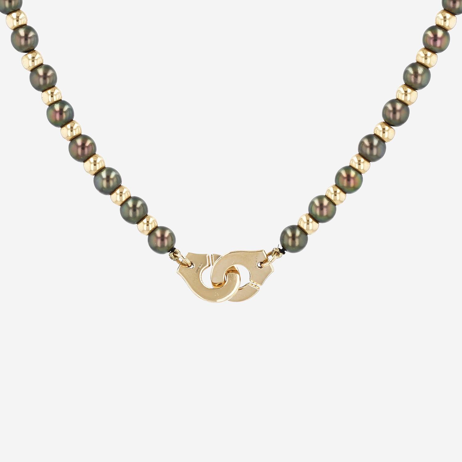 Dinh Van Menottes R12 necklace in yellow gold and cultured pearl