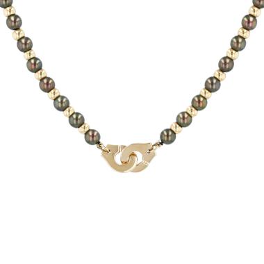 Dinh Van Menottes R12 necklace in yellow gold and cultured pearl