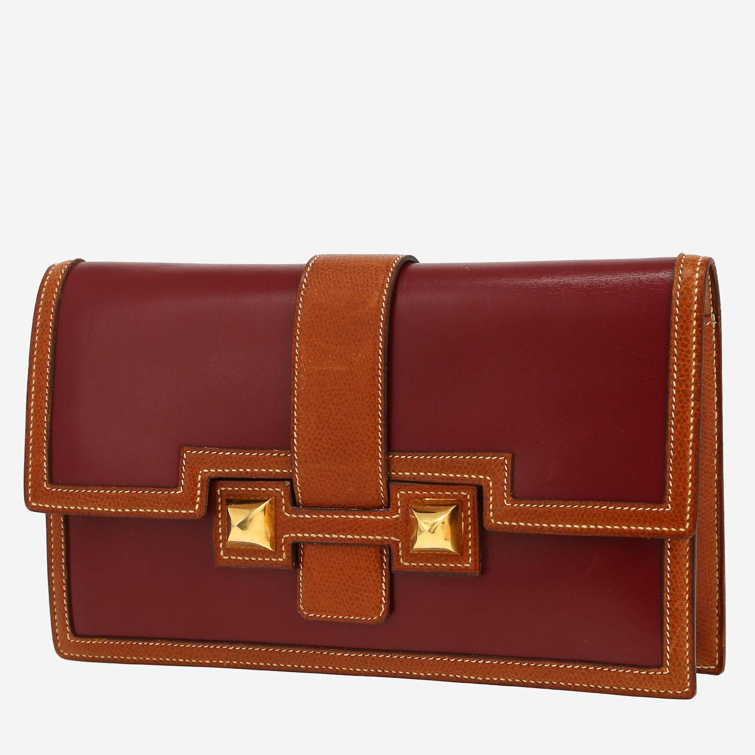 Bolsito de mano Hermès  Médor en cuero box color burdeos y cuero Courchevel color oro